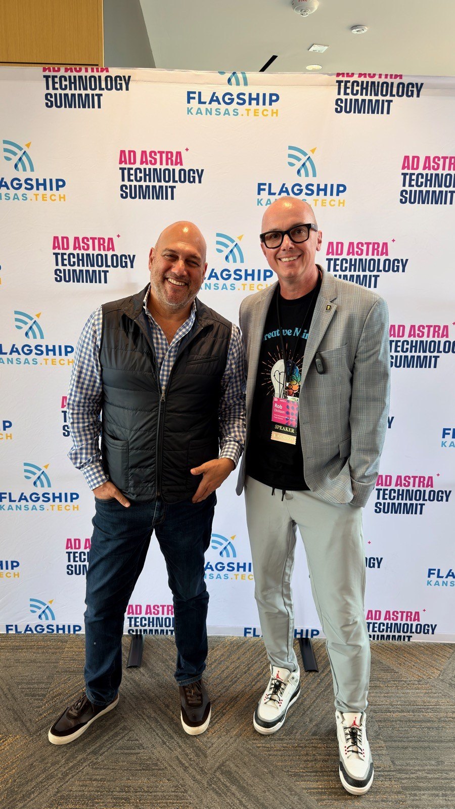 Rob Dickson with Salim Ismail at the Ad Astra Technology Summit backdrop