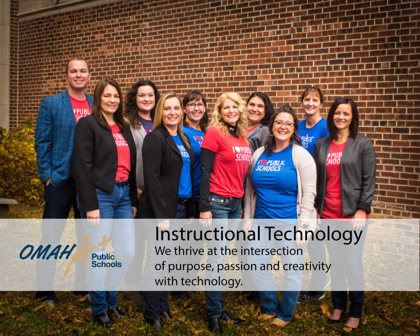 The OPS Instructional Technology team outside an Omaha Public Schools building in 2017.